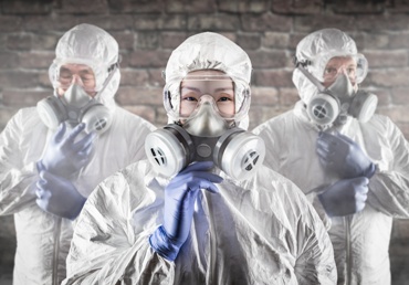 The HHS recently released all state testing plans for COVID-19. Three doctors suit up to administer coronavirus tests.