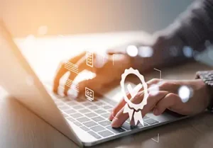 business woman's hand presses the laptop to compare fmos